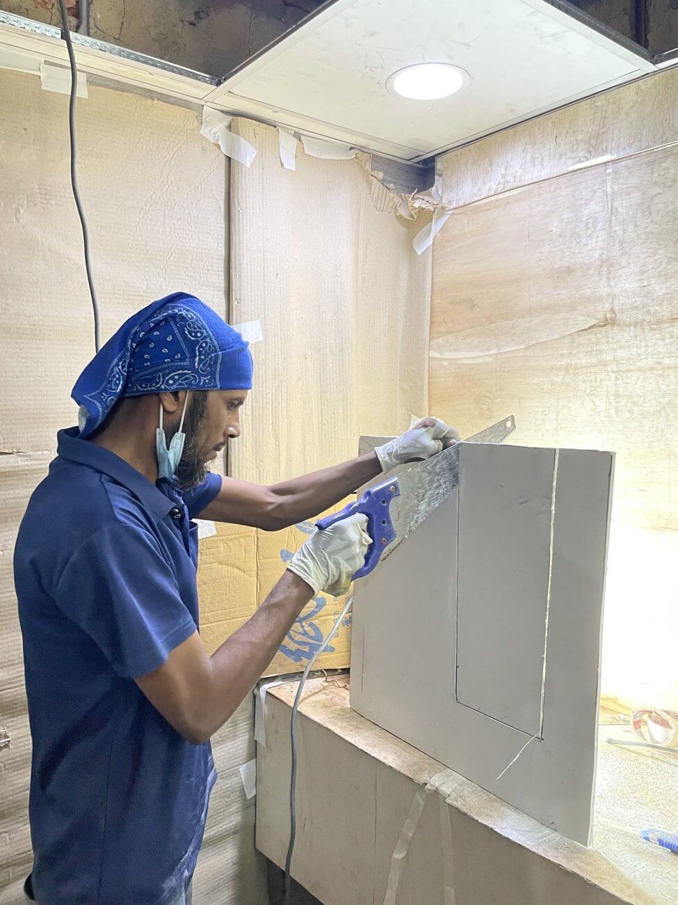 Cutting Of Ceiling Boards To Replace Worn Out Boards