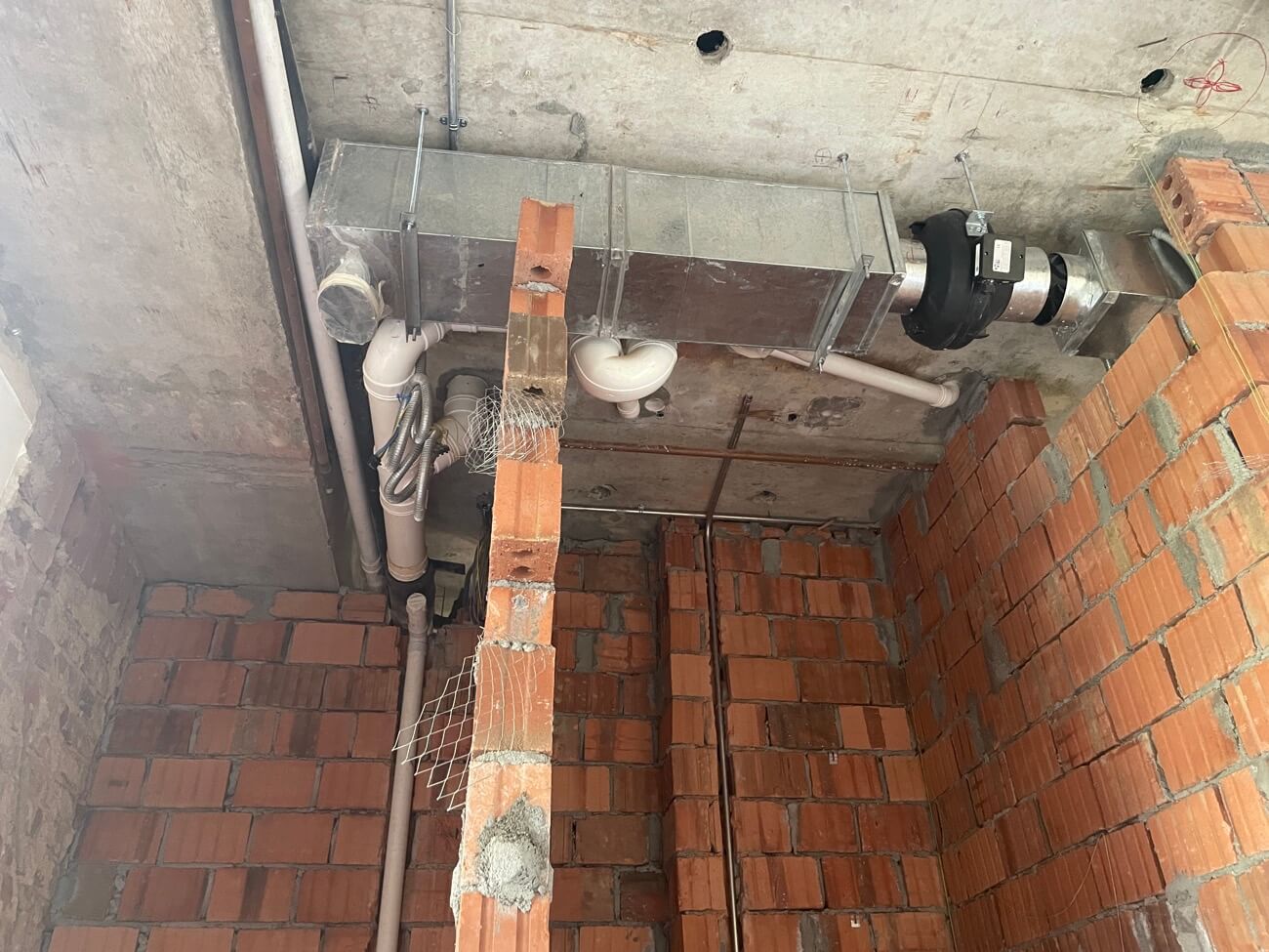 Ventilation Fan For Expelling Air From Adjacent Toilets